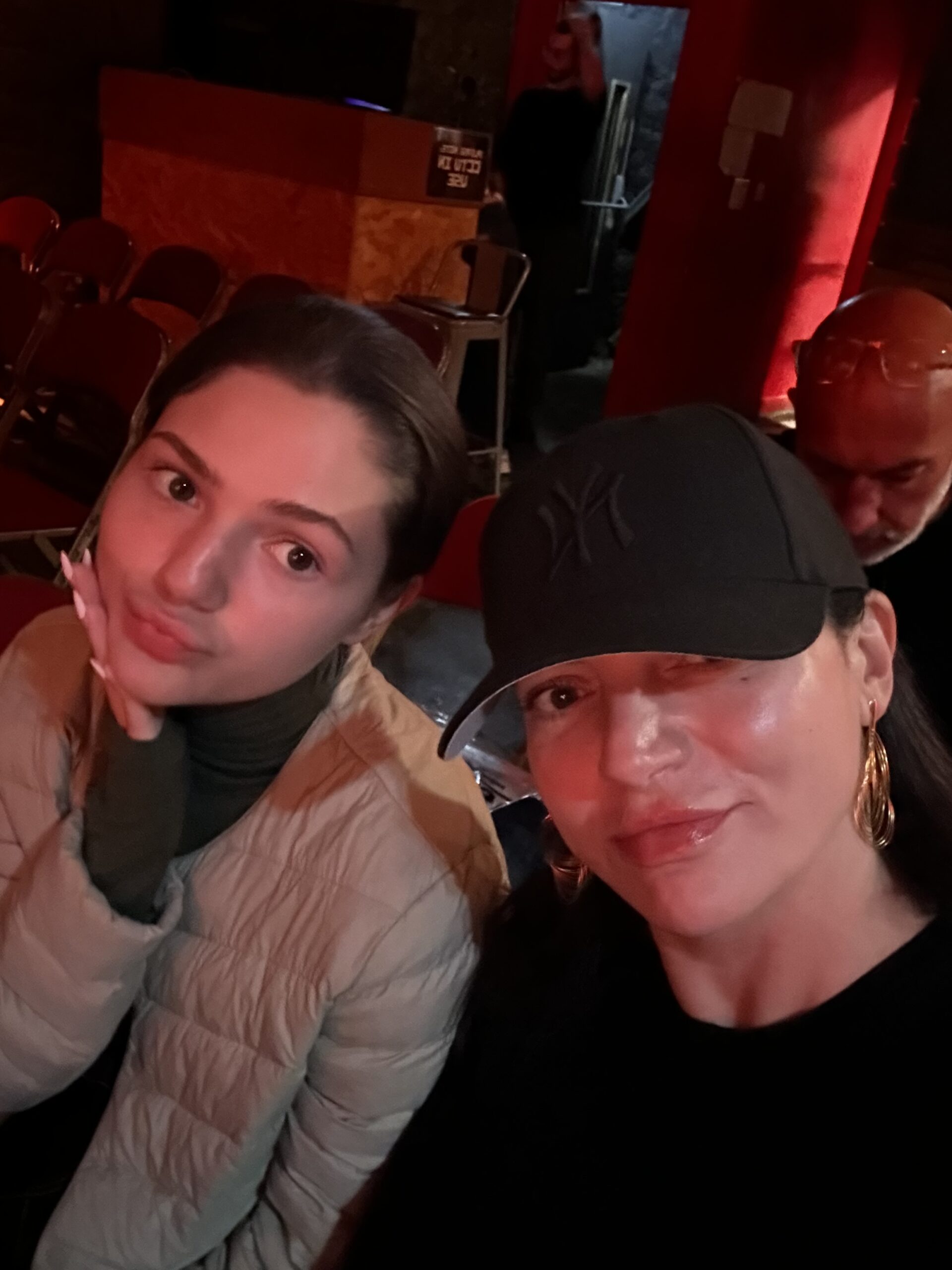 Eteri McKenzie, Solution-Focused Hypnotherapist in Edinburgh, shares a moment with her daughter at the Fringe Festival.